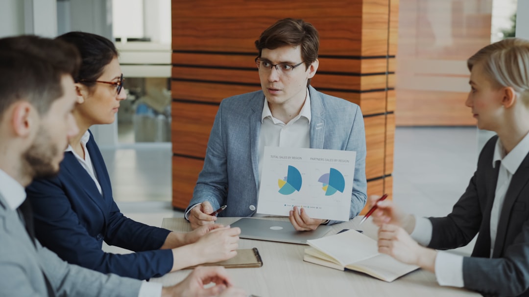 Specialist presenting verified briefing to consulting team